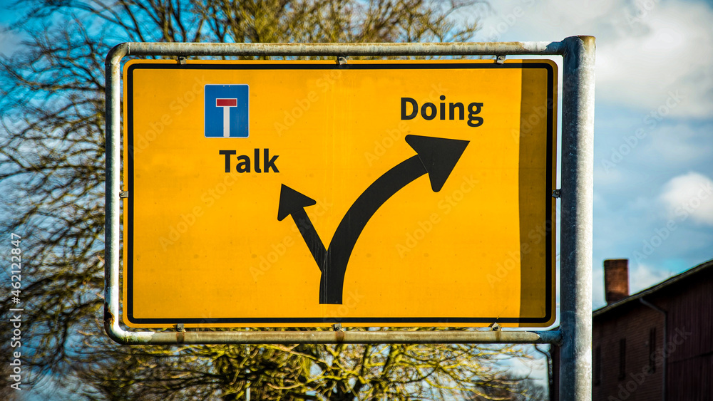 Street Sign to Doing versus Talk - obrazy, fototapety, plakaty 