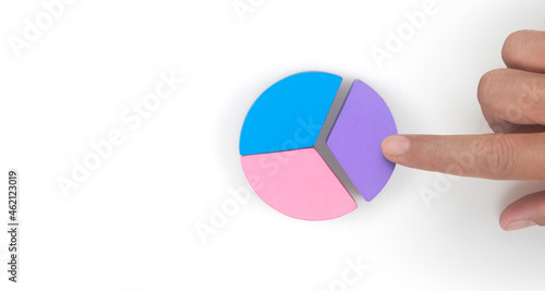 Business connecting piece of multi colored pie wood chart