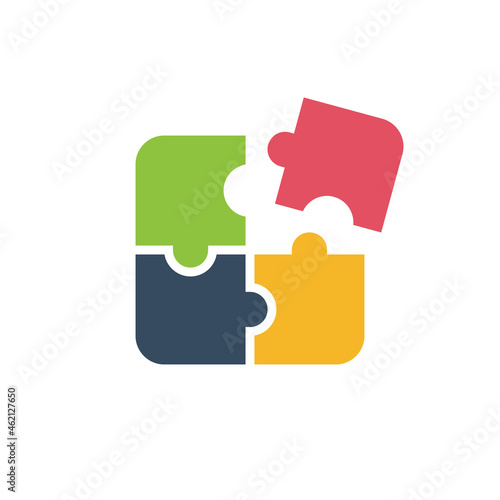 Four pieces Puzzle icon, four colors. teamwork solution symbol. Stock Vector illustration isolated on white background.