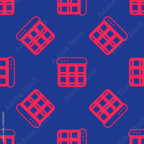 Red Online shopping on screen icon isolated seamless pattern on blue background. Concept e-commerce, e-business, online business marketing. Vector