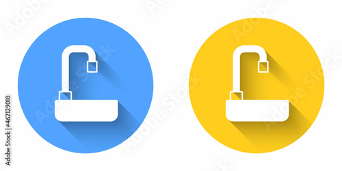 White Washbasin with water tap icon isolated with long shadow background. Circle button. Vector