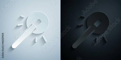 Paper cut Magic wand icon isolated on grey and black background. Star shape magic accessory. Magical power. Happy Halloween party. Paper art style. Vector