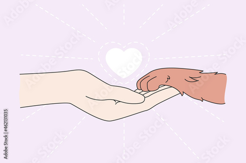 Human hand hold dog paw show care and love for animals. Person and pet friendship. People caring about puppies and cats. Flat vector illustration. Adoption and shelter, charity, volunteer concept. 