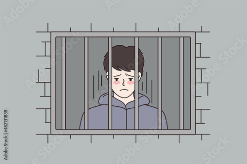 Sad man behind steel bars in country jail. Distressed unhappy male feel depressed sit in prison. Criminal convict imprisoned for illegal actions. Cartoon character flat vector illustration.