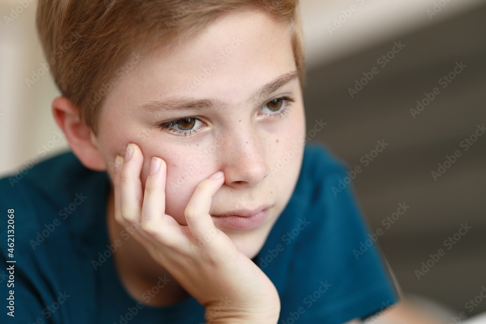 Portrait of thoughtful teenage young boy on light background Portrait of thoughtful teenage young boy on light background