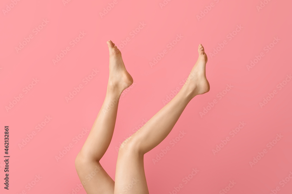 Legs of beautiful woman on color background Legs of beautiful woman on color background