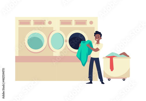 Happy man takes clothes out or loads washing machine in public laundry - flat vector illustration isolated