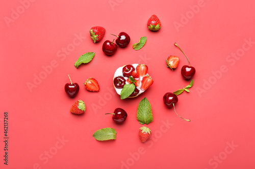 Composition with tasty berry tart on color background