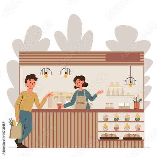 Modern cozy cafe with a coffee and bakery. Nice woman  made takeaway coffee for a young man. A seller and a customer.