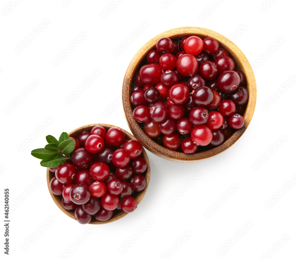 Bowls of ripe cranberries on white background Bowls of ripe cranberries on white background