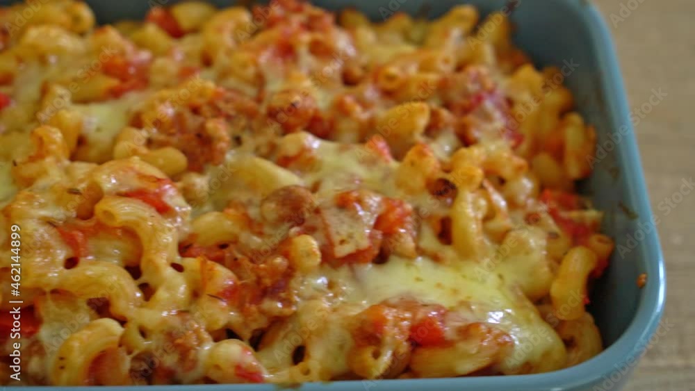 homemade baked macaroni bolognese with cheese - Italian food style homemade baked macaroni bolognese with cheese - Italian food style