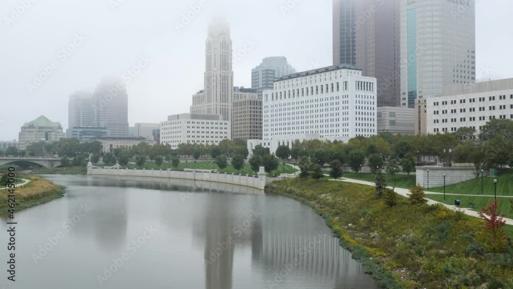 Kayaking in downtown Columbus, Ohio on the Scioto River on a foggy day. Kayaking in downtown Columbus, Ohio on the Scioto River on a foggy day.