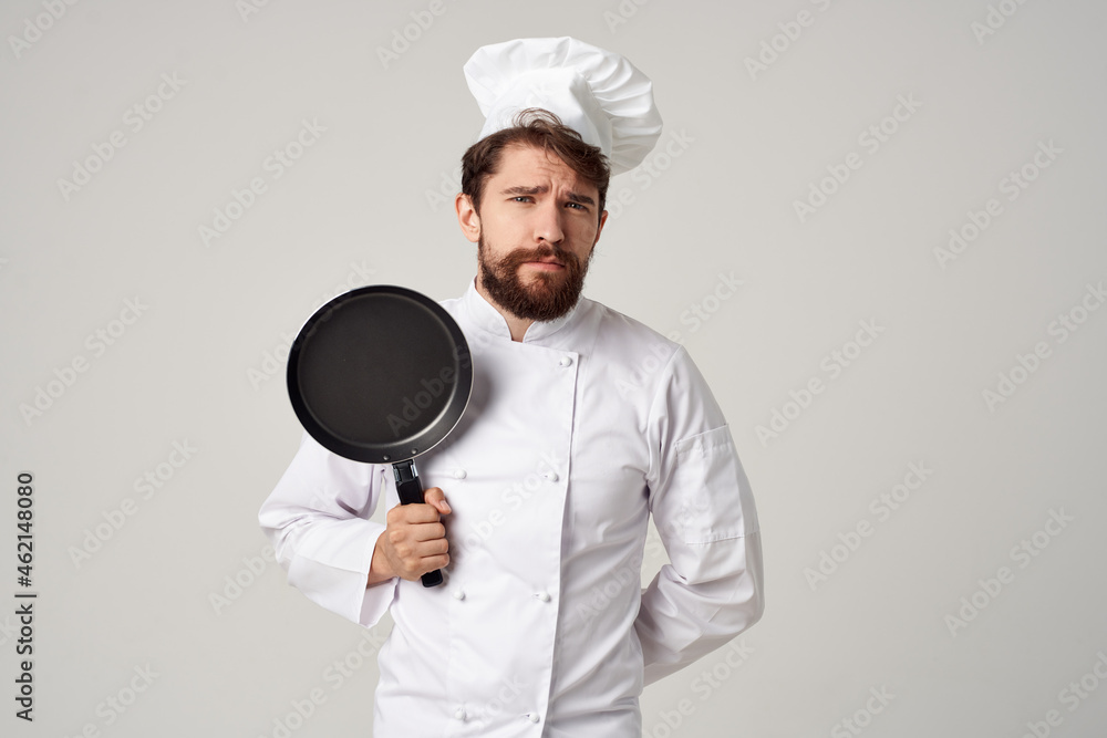 a man in a chef's uniform kitchen utensils Job Professional a man in a chef's uniform kitchen utensils Job Professional