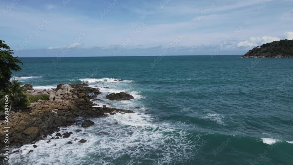 Drone top view of beautiful turquoise sea waves breaking on sandy coastline Drone top view of beautiful turquoise sea waves breaking on sandy coastline