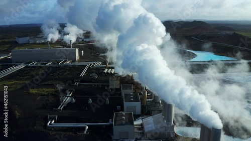 White Thick Smoke Coming Out On Chimney Of Reykjanes Power Plant In Iceland. - aerial photo