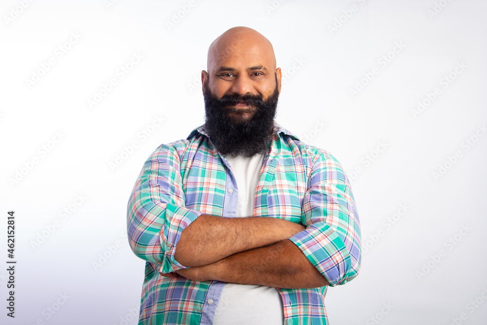 Indian Strong Healthy confident bald guy, Standing & Folding arms looking at Camera Indian Strong Healthy confident bald guy, Standing & Folding arms looking at Camera