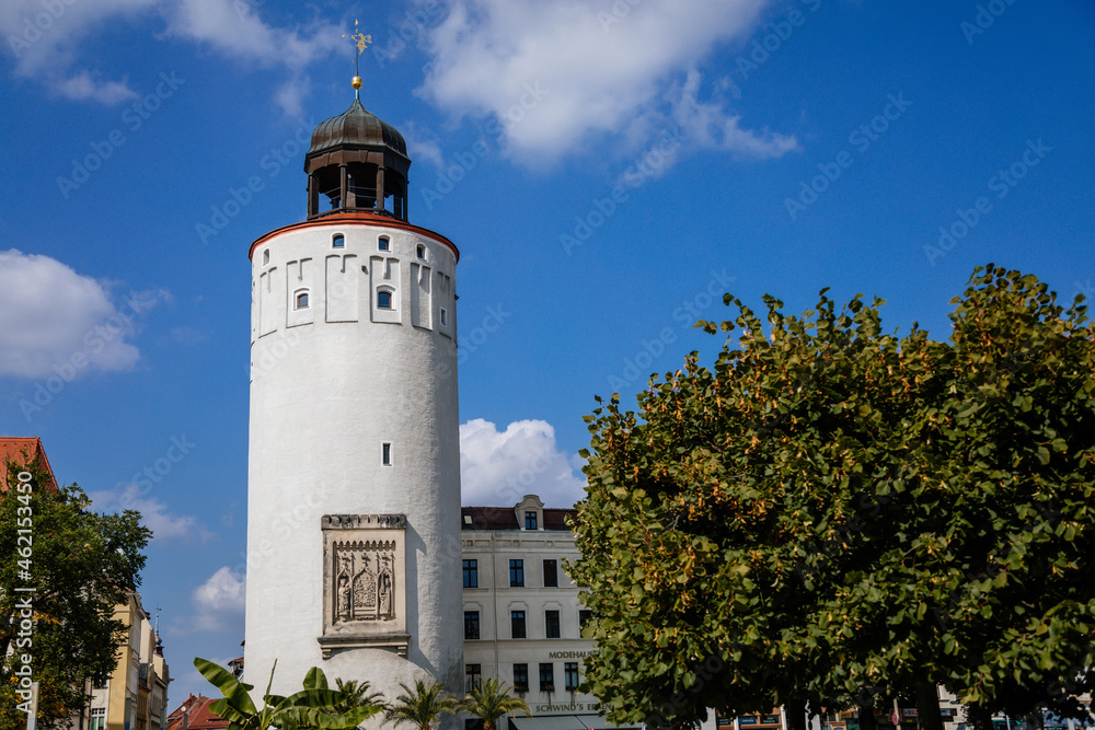 Goerlitz, Germany, 04 September 2021: gothic renaissance massive Thick Tower or Dicker Turm with Sandstone Relief at Marienplatz in historical center, part of medieval fortification, sunny summer day Goerlitz, Germany, 04 September 2021: gothic renaissance massive Thick Tower or Dicker Turm with Sandstone Relief at Marienplatz in historical center, part of medieval fortification, sunny summer day
