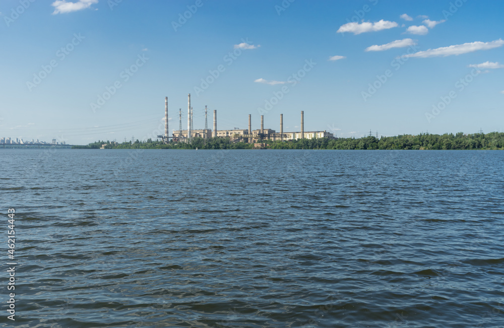 Summer  landscape with non working  electric power station beside Dnipro river in Dnipro city, Ukraine