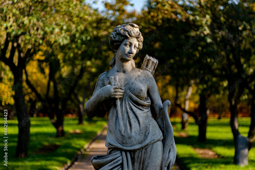 Statue godness Diana in the city park, atutumn landscape, Moscow, Kolomentskoe	