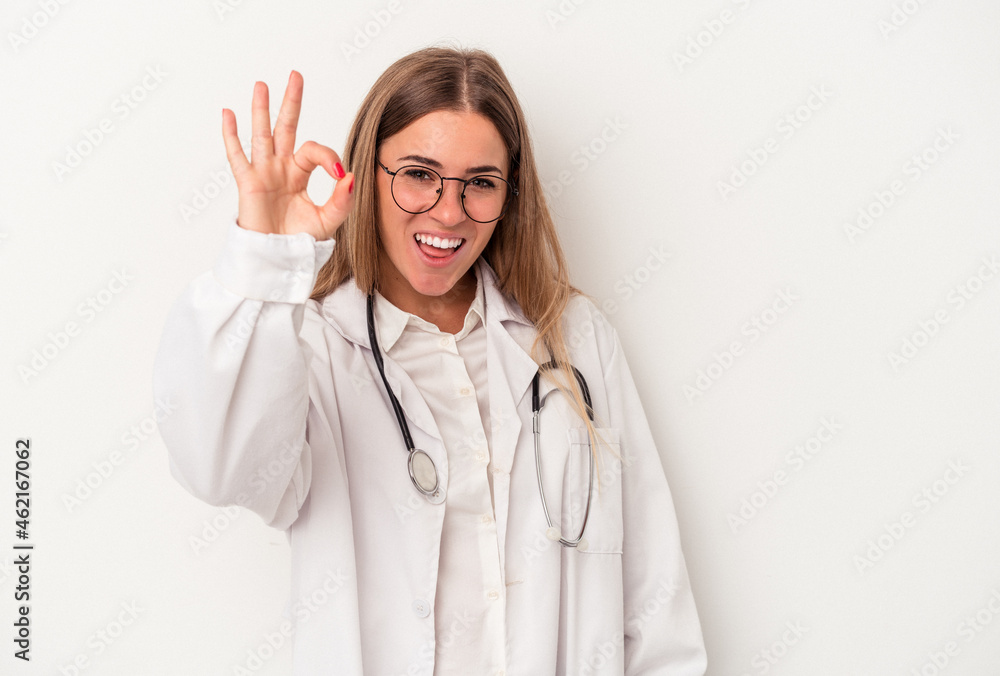 Young doctor Russian woman isolated on white background cheerful and confident showing ok gesture. Young doctor Russian woman isolated on white background cheerful and confident showing ok gesture.