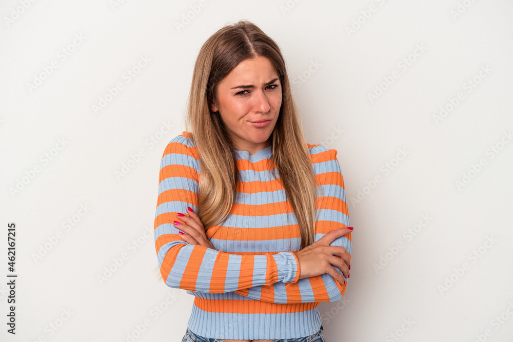 Young Russian woman isolated on white background suspicious, uncertain, examining you. Young Russian woman isolated on white background suspicious, uncertain, examining you.