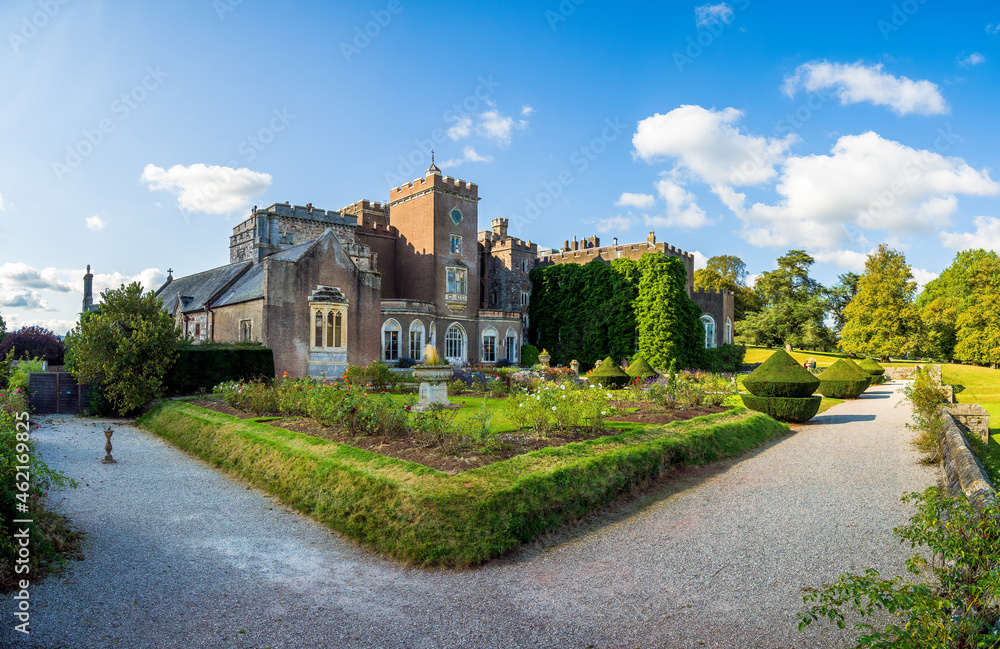 Old house and castle with rose garden in Devon