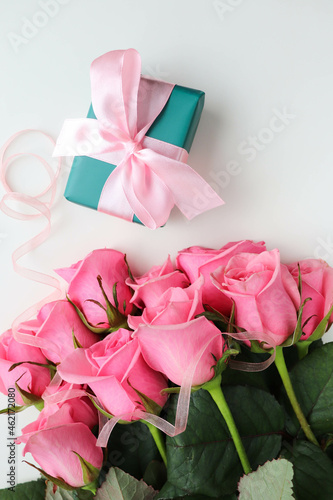 greeting card design. rose bouquet and gift box  © Palanga