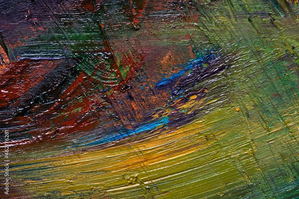 Oil paint strokes abstract background of warm colors and shades of green red yellow blue on wood artist palette. Textured smeared mixed colors on canvas. Wallpaper template backdrop. Copy space Oil paint strokes abstract background of warm colors and shades of green red yellow blue on wood artist palette. Textured smeared mixed colors on canvas. Wallpaper template backdrop. Copy space