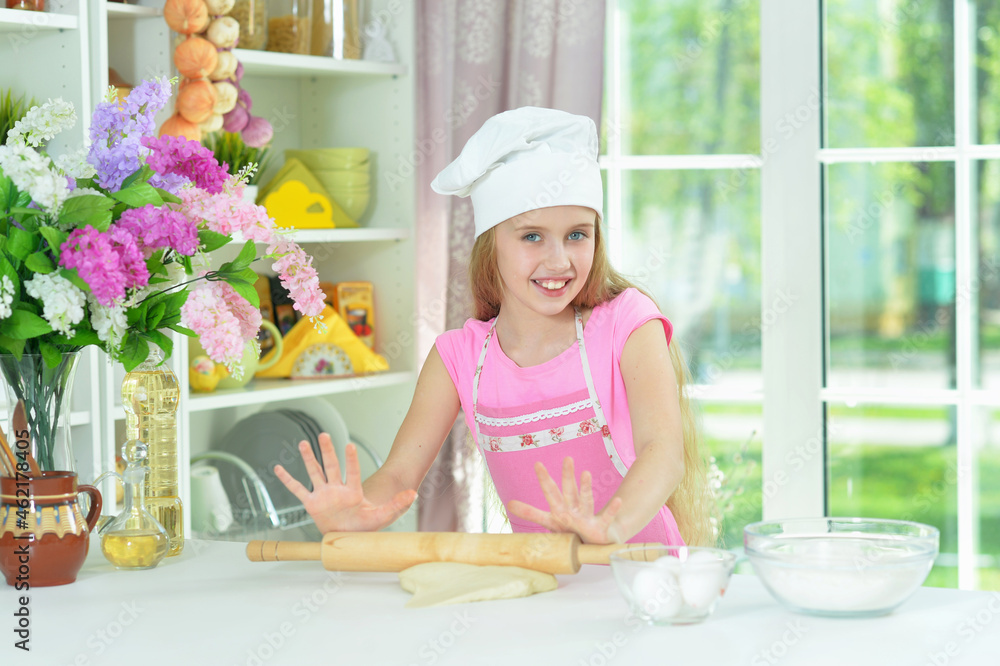 Portrait of young girl baking in the kitchen Portrait of young girl baking in the kitchen