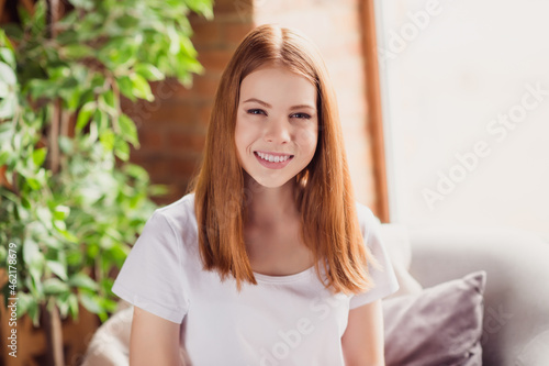 Photo of young attractive cheerful girl teenager happy positive smile ginger hair home comfort weekend