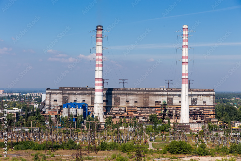 Fossil fuel thermal power station against the sky