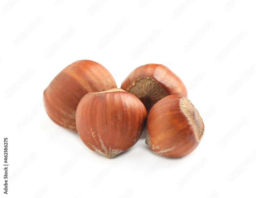 Tasty organic hazelnuts on white background. Healthy snack