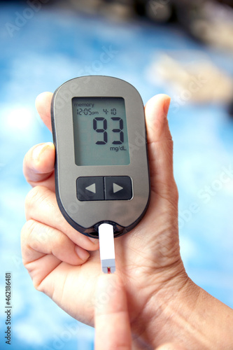 measuring glucose level blood photo
