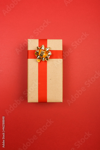 Craft gift on a red background. Flat style.