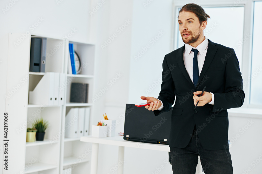 manager in the office with documents lifestyle manager in the office with documents lifestyle