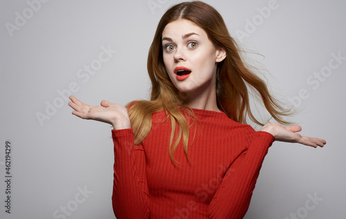 cheerful woman fashion hairstyle red sweater model isolated background
