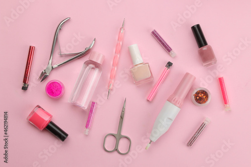 Various tools and things for manicure and pedicure on a pink background. view from above. nail care.