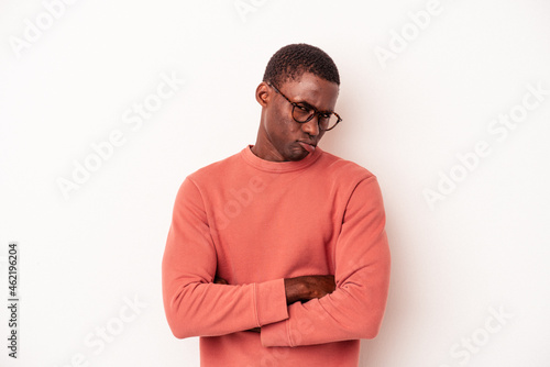 Young African American man isolated on white background unhappy looking in camera with sarcastic expression. © Asier