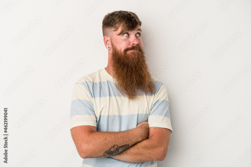 Young caucasian ginger man with long beard isolated on white background dreaming of achieving goals and purposes Young caucasian ginger man with long beard isolated on white background dreaming of achieving goals and purposes