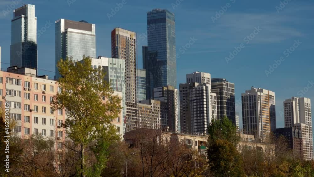 Urban autumn landscape. A trip on a pleasure boat along the canals of Moscow. Views of modern urban development and yellowing foliage. Urban autumn landscape. A trip on a pleasure boat along the canals of Moscow. Views of modern urban development and yellowing foliage.
