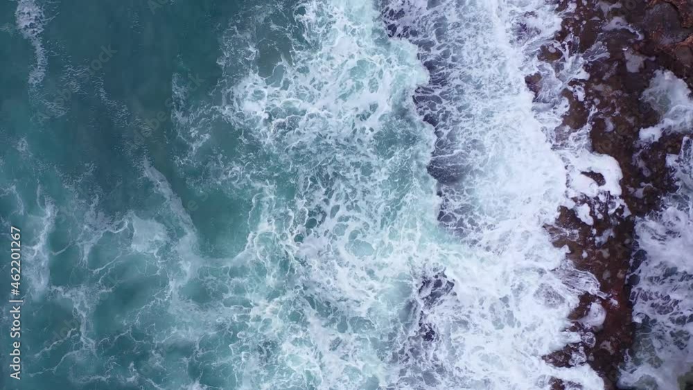 Aerial view of waves splashing on beach Aerial view of waves splashing on beach