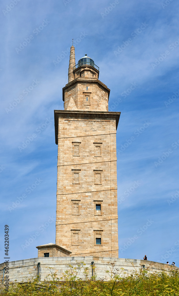 the Tower of Hercules with tourists and visitors at the base waiting to enter to see it