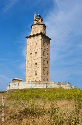 the Tower of Hercules with tourists and visitors at the base waiting to enter to see it