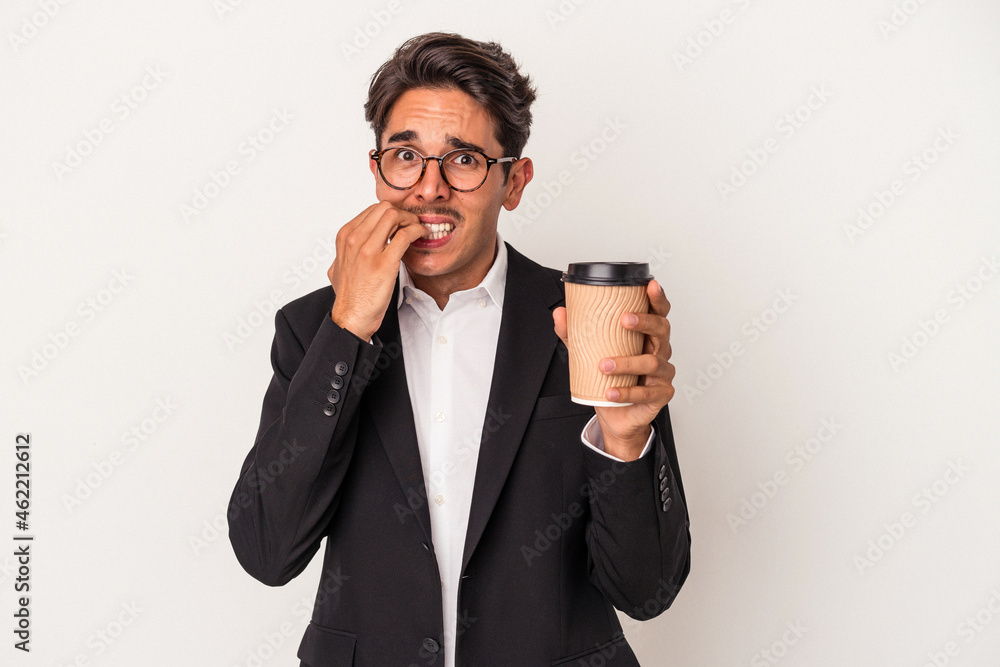 Young mixed race business man holding take away coffee isolated on white background biting fingernails, nervous and very anxious. Young mixed race business man holding take away coffee isolated on white background biting fingernails, nervous and very anxious.