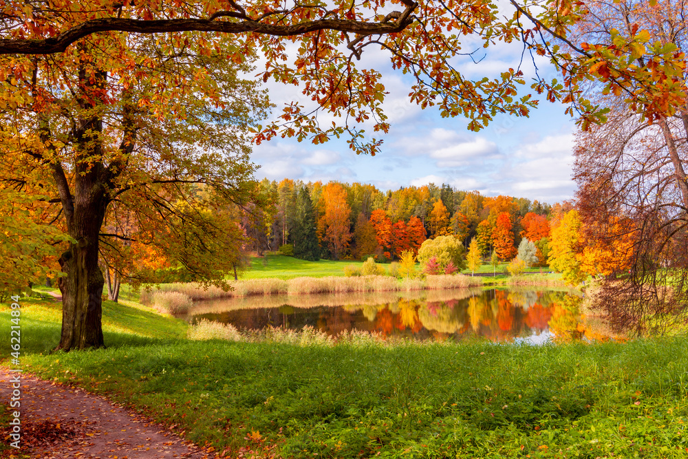 Autumn foliage at the pond in Pavlovsky park, Pavlovsk, St. Petersburg, Russia Autumn foliage at the pond in Pavlovsky park, Pavlovsk, St. Petersburg, Russia