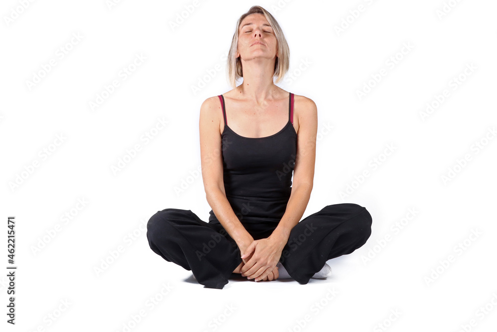 natural woman in her forties, Caucasian, blonde, short hair, sitting in a relaxed position on a white background 
