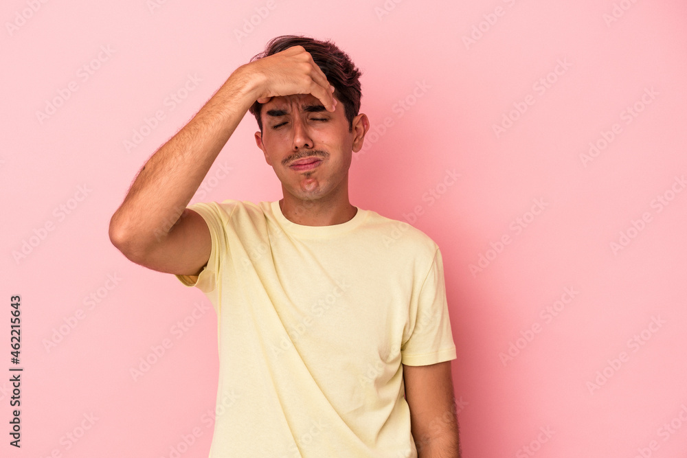 Young mixed race man isolated on white background touching temples and having headache. Young mixed race man isolated on white background touching temples and having headache.
