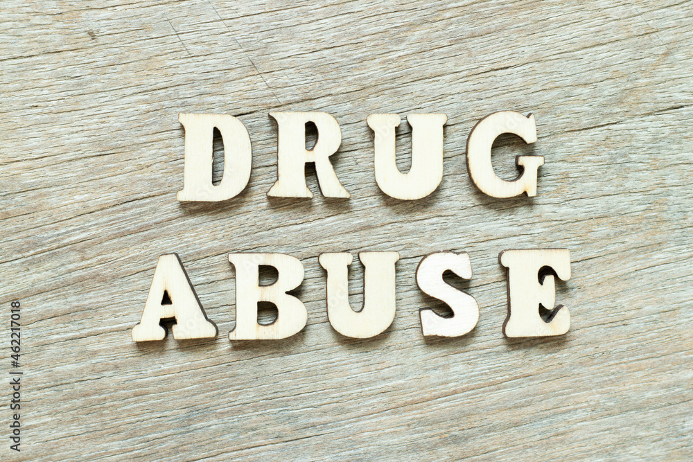 Alphabet letter in word drug abuse on wood background Alphabet letter in word drug abuse on wood background