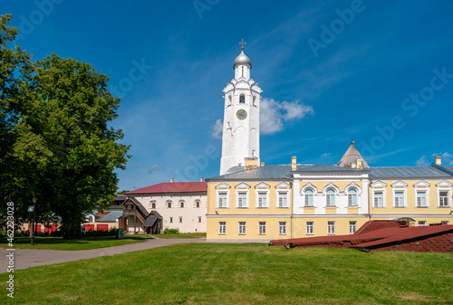 Clock tower of the Novgorod Kremlin. Church of St. Sergius of Radonezh at Vladychny Dvor on the territory of Novgorod Detinets. photo