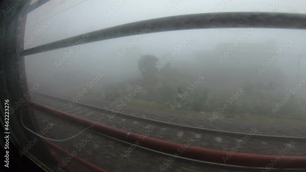 Train window leaning out point of view during long distance train ride travel, Indian Railways Train window leaning out point of view during long distance train ride travel, Indian Railways